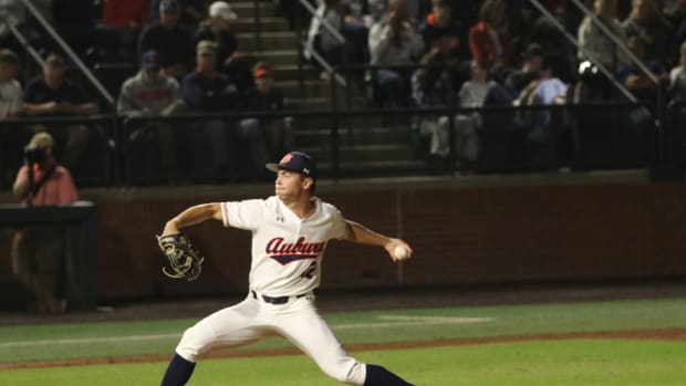 Drew Nelson pitching for Auburn baseball.